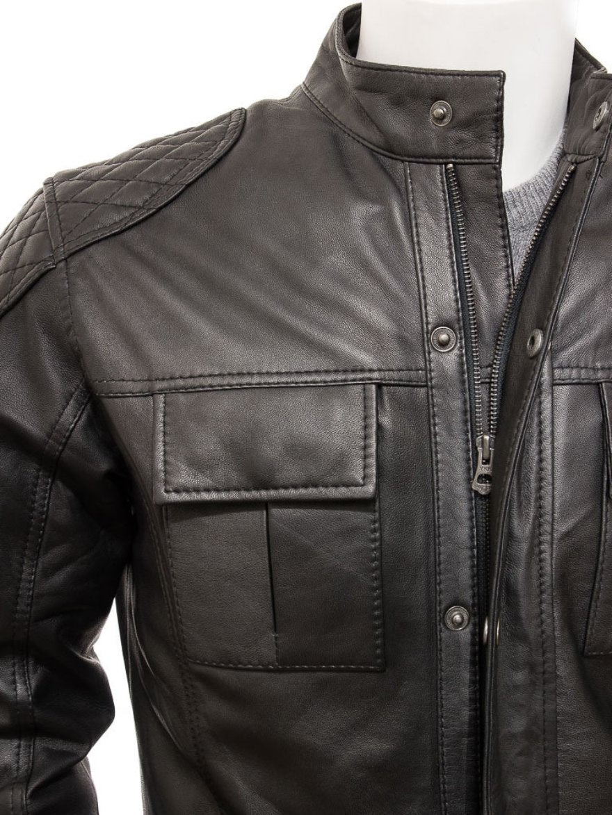 Picture of our Black Leather Field Jacket, close up view of the chest pocket