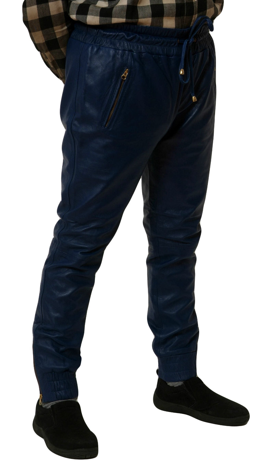 Picture of a model wearing our blue leather joggers, side view