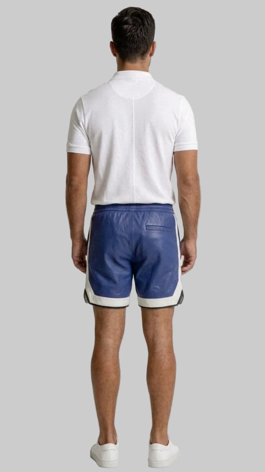 Man wearing a white polo shirt and our Blue Mens Leather Shorts with Contrast Side Stripe  against a white wall, back view.