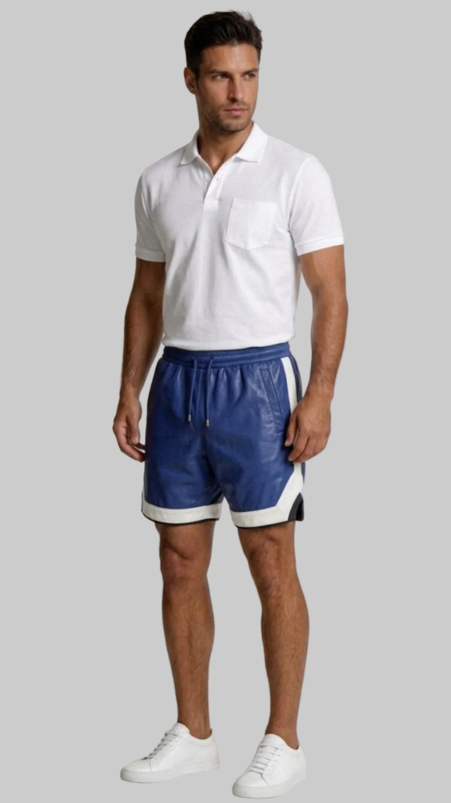 Man wearing a white polo shirt and our Blue Mens Leather Shorts with Contrast Side Stripe  against a white wall, front view.