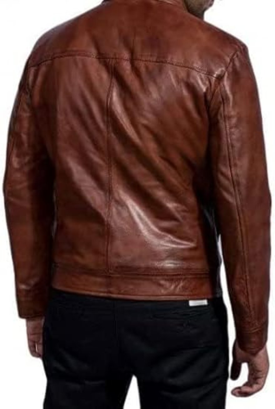 Picture of a model wearing our brown leather jacket, back view.