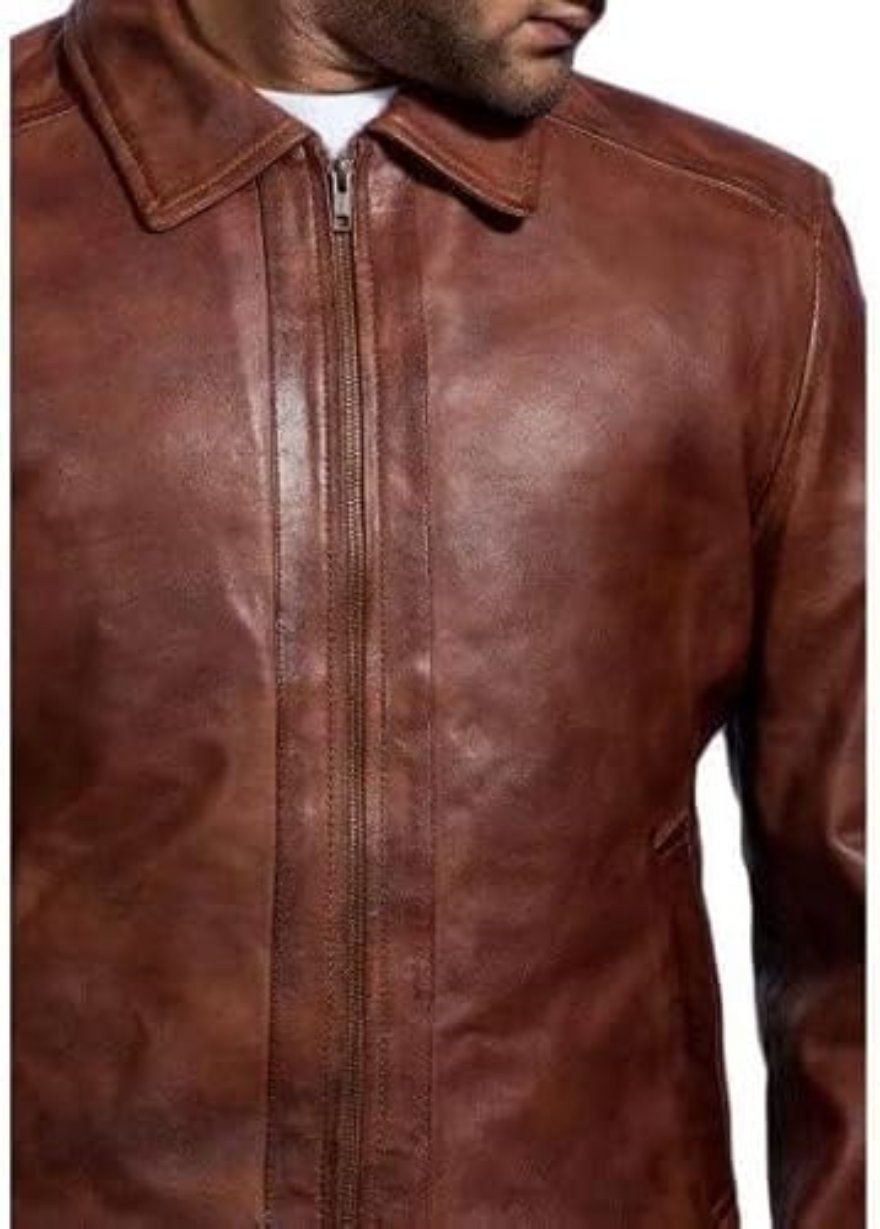 Picture of a model wearing our brown leather jacket, front view, close up.