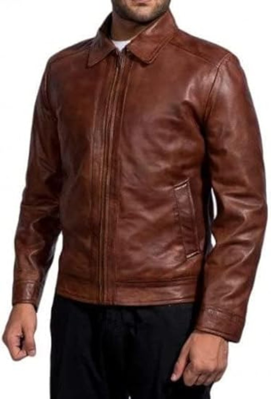 Picture of a model wearing our brown leather jacket, front view.