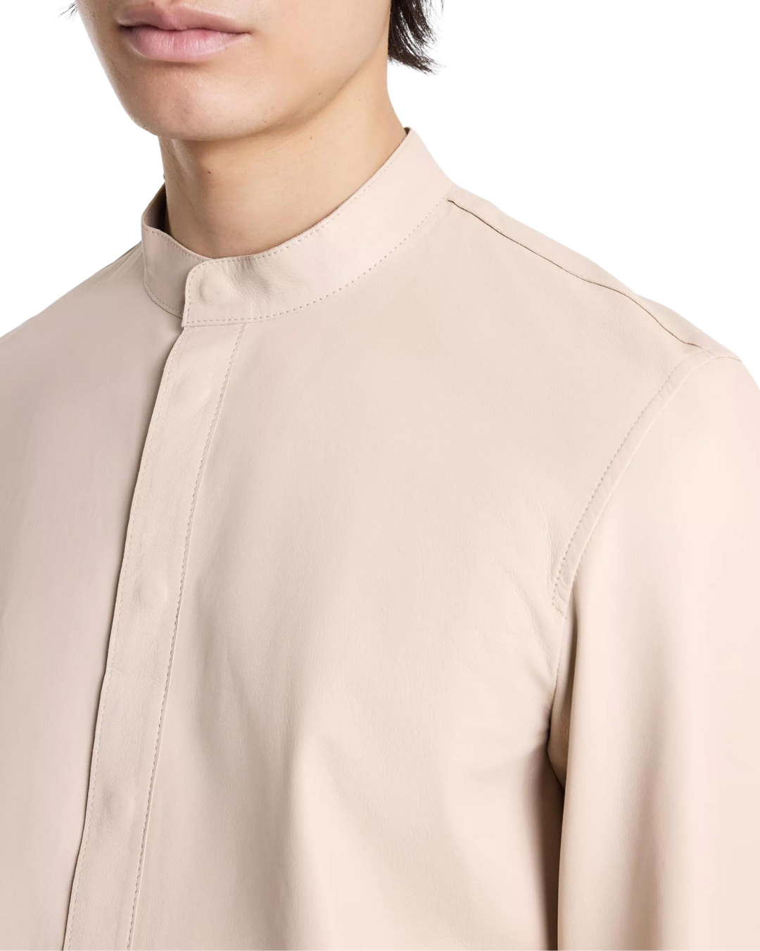 Picture of a model wearing our Cream Leather Shirt, close up  view