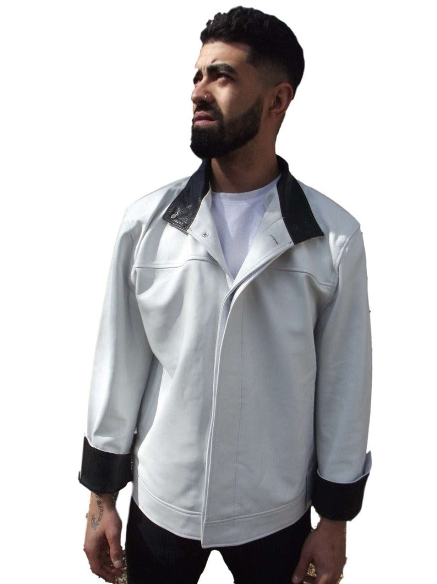 Picture of a model wearing our Mandarin Collar Leather Jacket in white with black embossed snakeskin pattern on cuff & collar, front view.