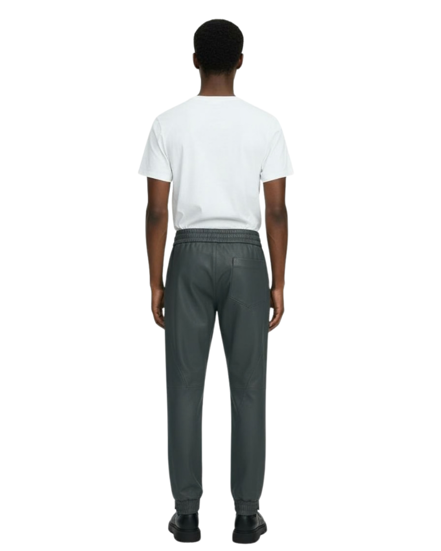 Person wearing a white t-shirt and our grey leather joggers on a white background  
