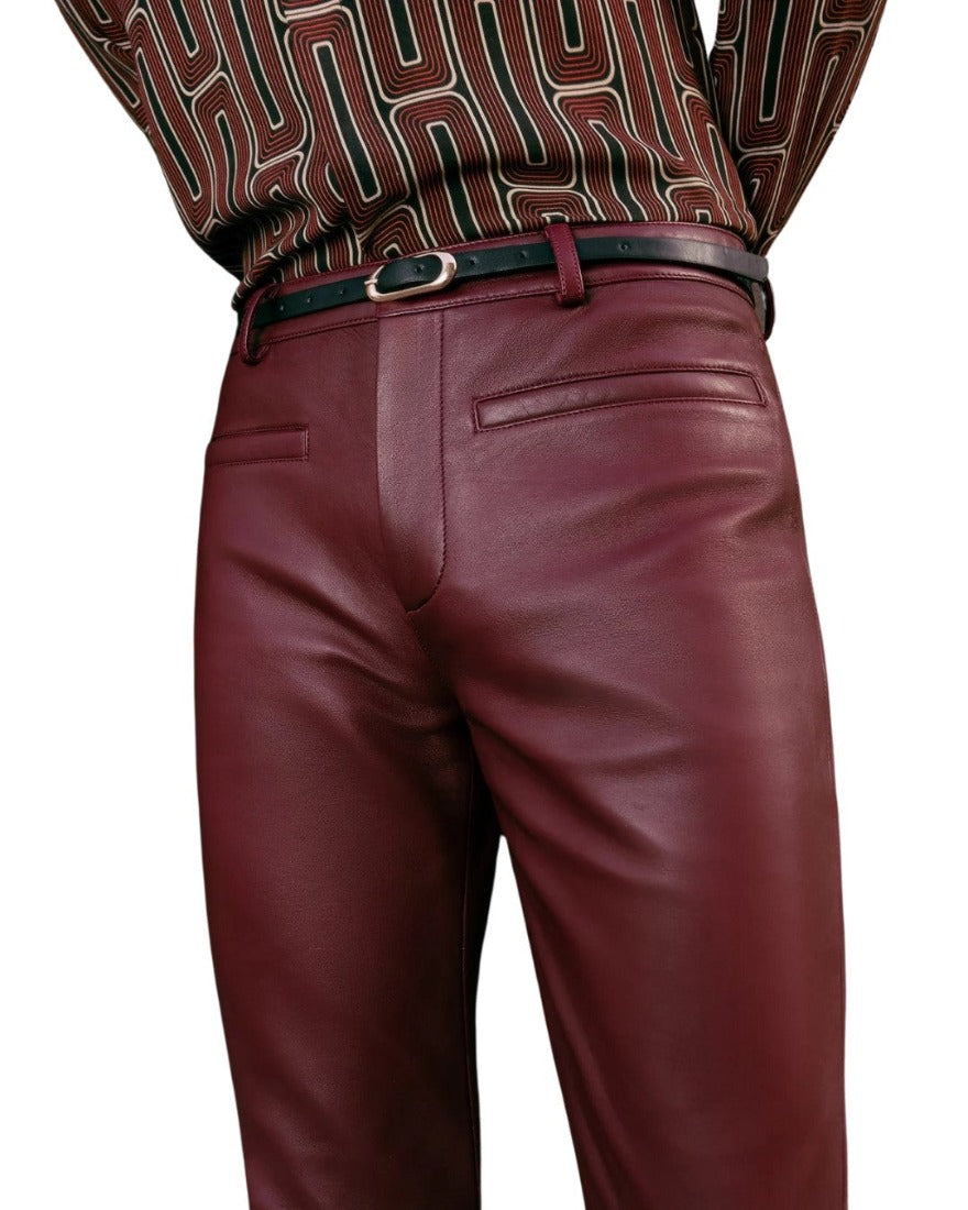 Picture of a model wearing our Mens Maroon Leather Pants, close up front view.