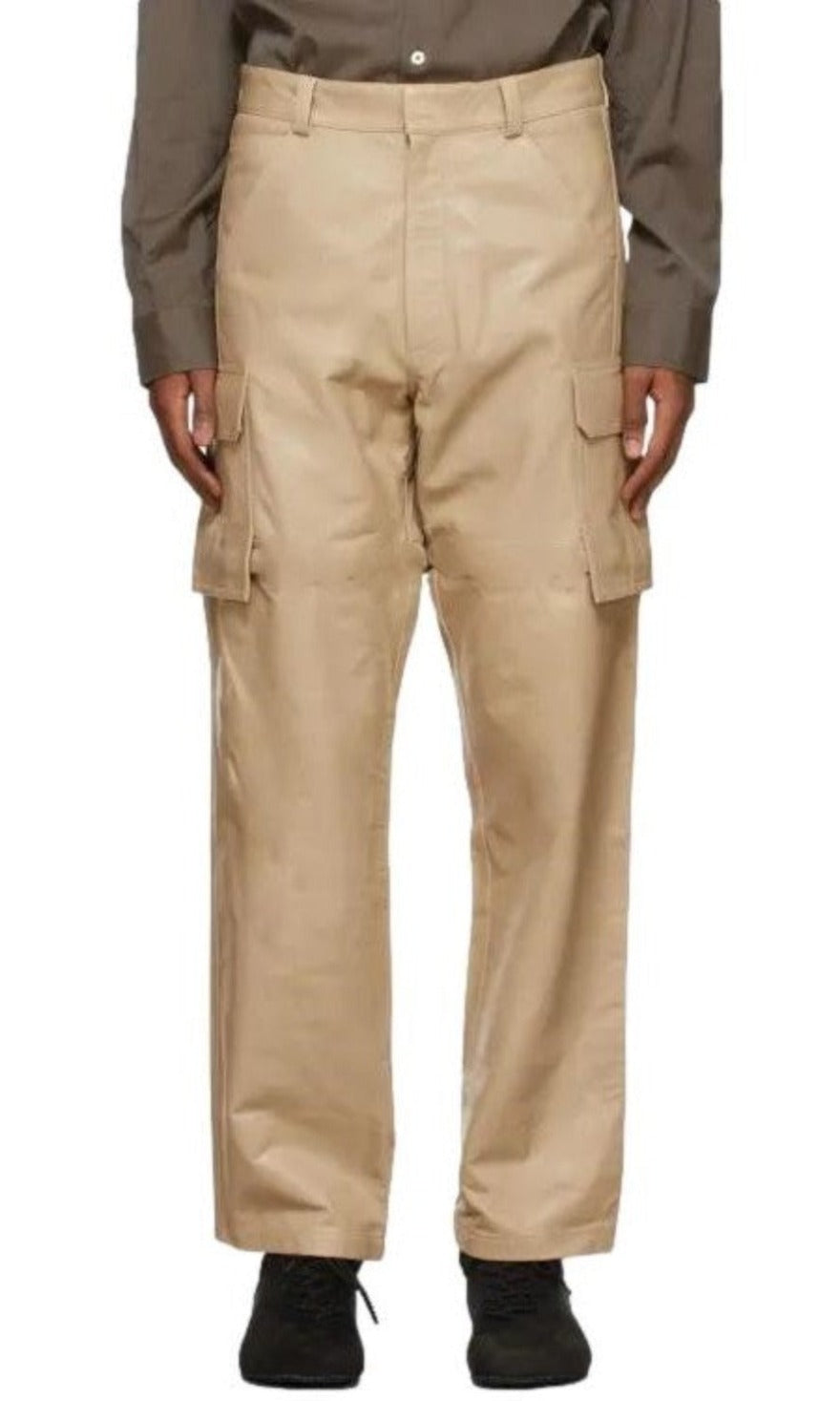 Picture of a model wearing our white leather cargo pants, front view.