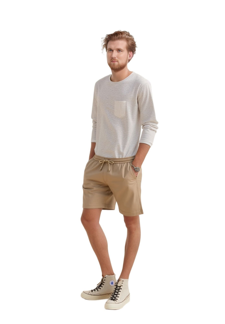 Man wearing a  white shirt and our Men's Beige Leather Shorts, full size side view.