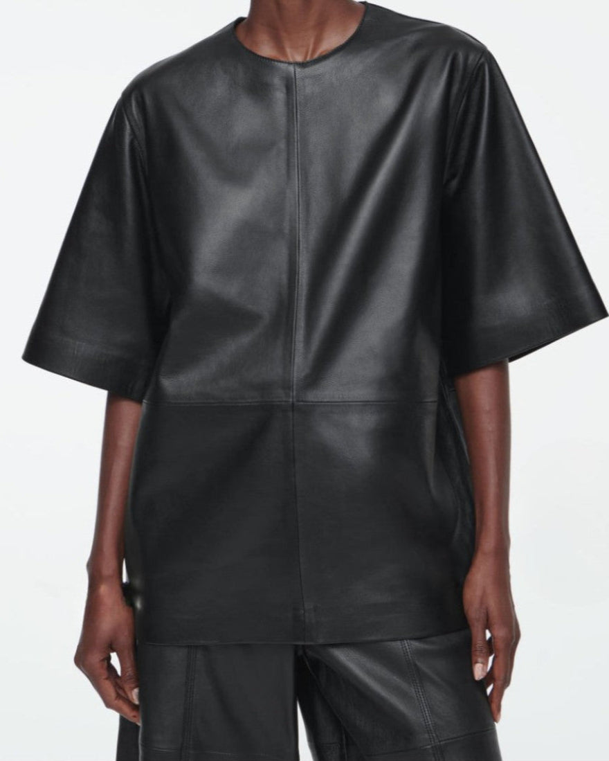 Picture a model wearing our black leather T Shirt, front view.