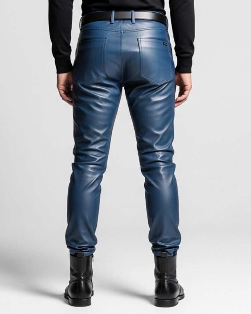 Blue leather pants worn by a person on a white background, back view.
