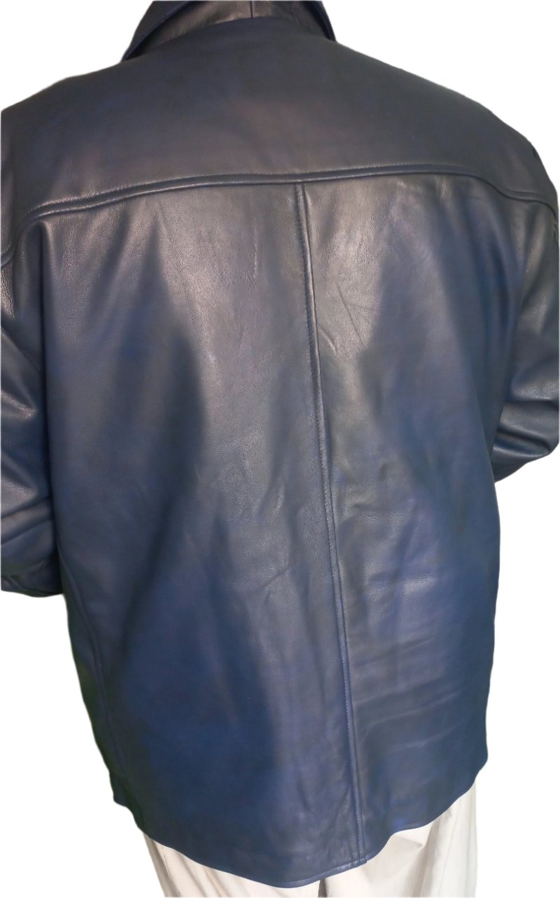 Picture of model wearing mens leather pea coat in navy, back view.