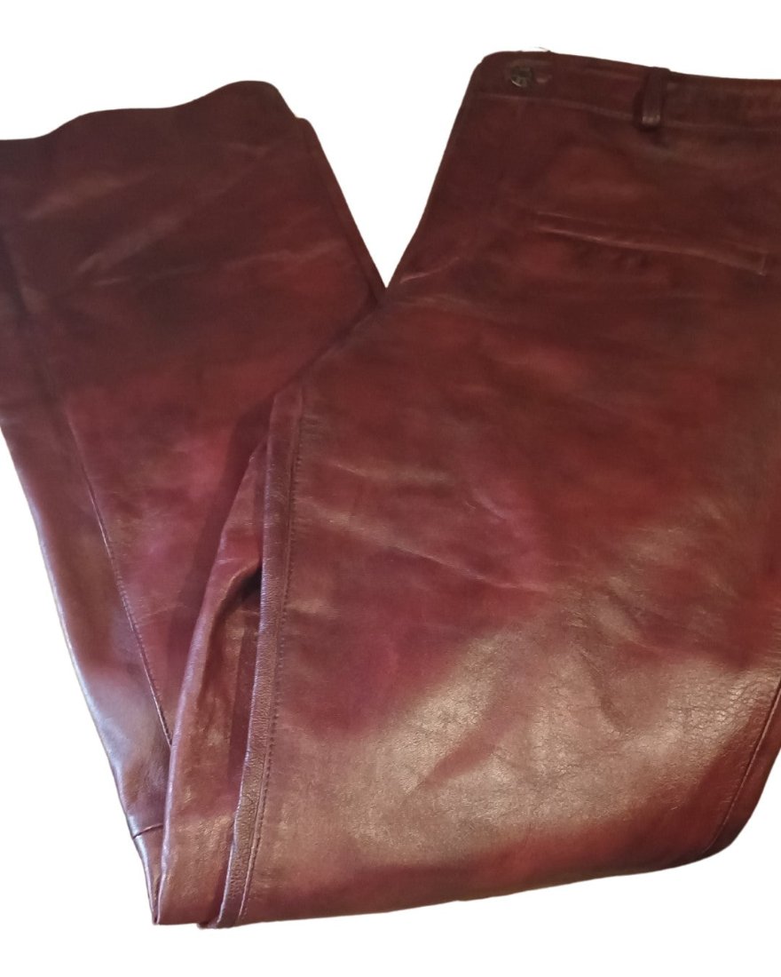 Picture of g our Mens Maroon Leather Pants, Front view folded in half laying flat.