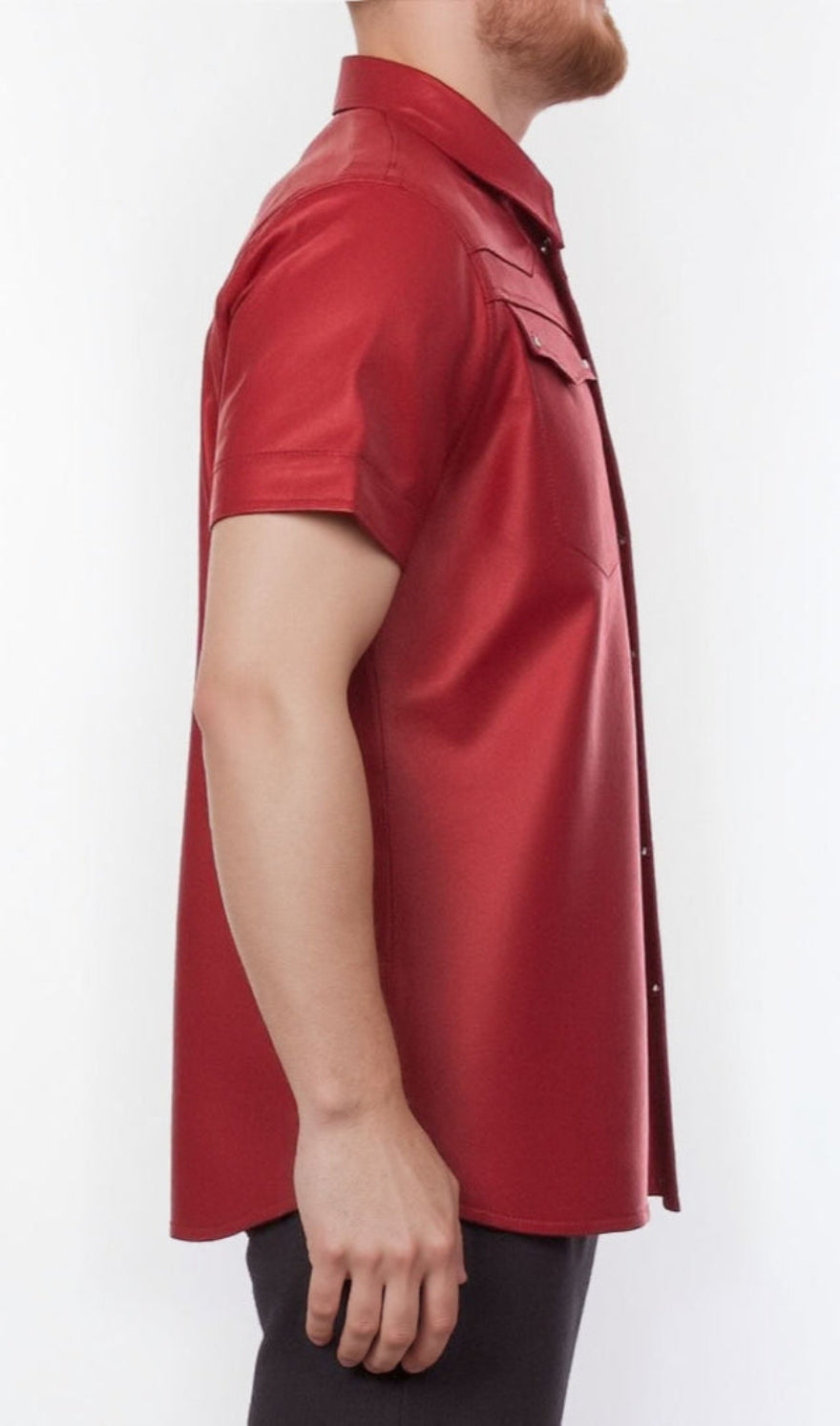 Picture of a model wearing our Red Leather short sleeve shirt, side view.