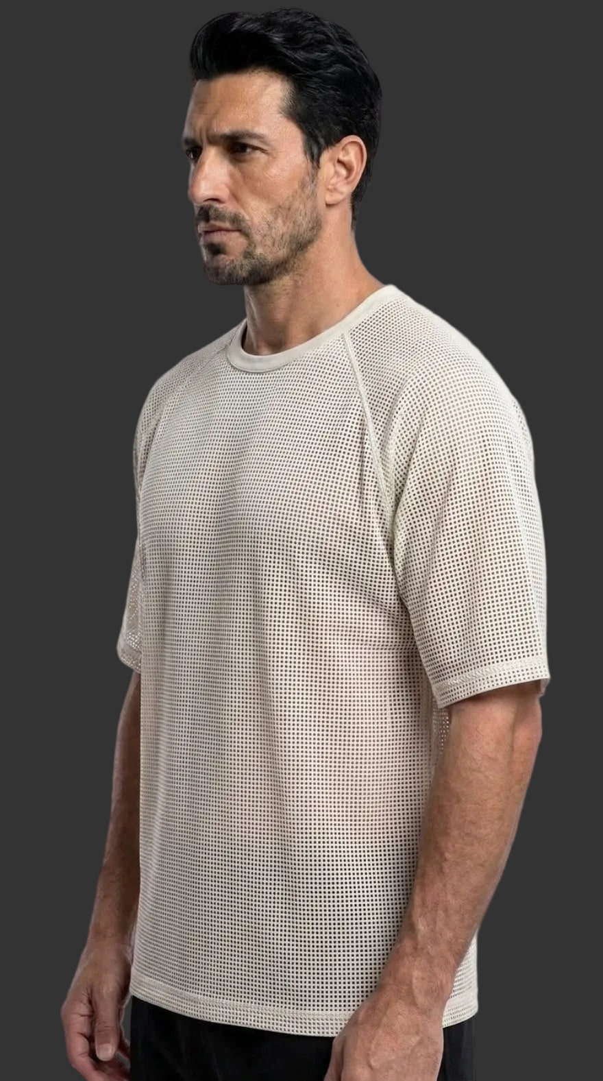 Picture of a model wearing our Mens White Perforated Leather Tee Shirt, Side view.