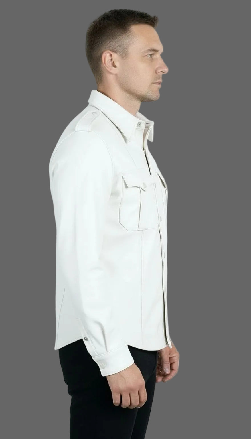 Man wearing our white leather uniform shirt, side view, on a grey background