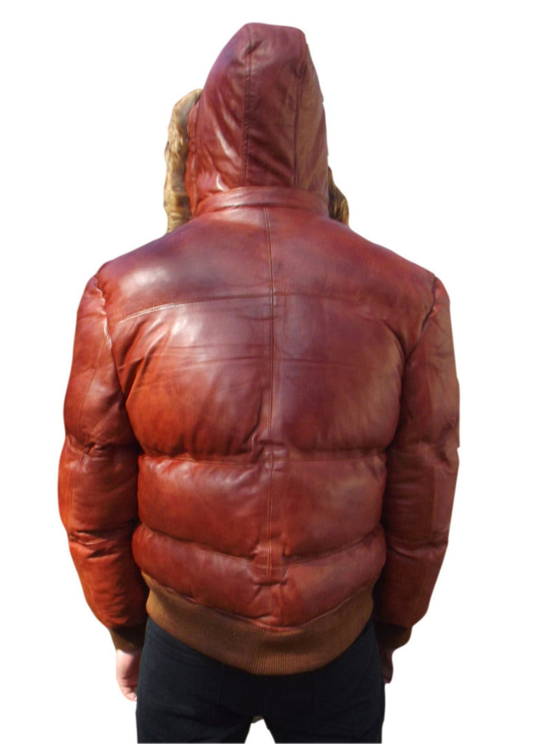 Picture of a model wearing our Brown Puffer Leather Jacket, back view with fur trimmed hood up.
