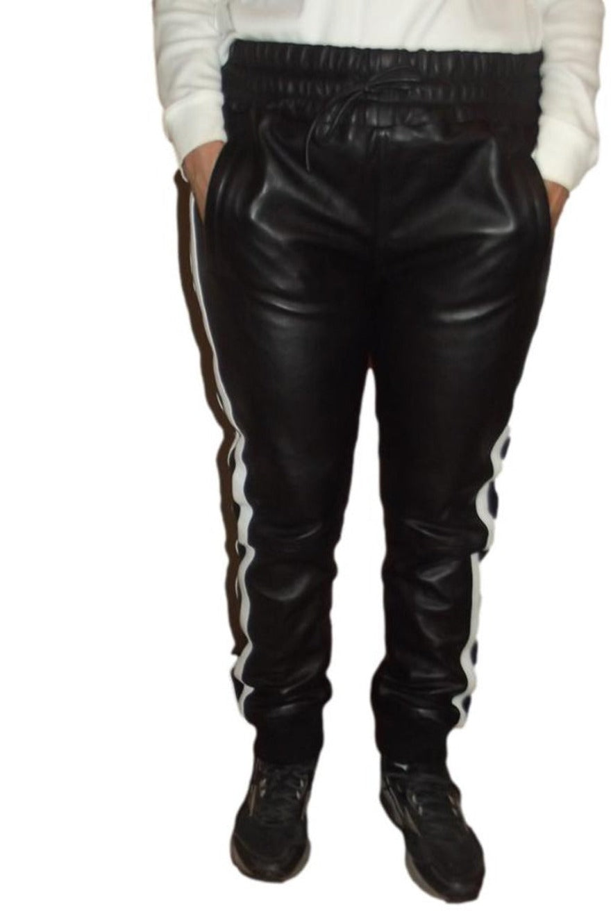 Picture of model wearing our Mens Black Leather Jogging Pants with 3 wide white stripes on outside of leg, front view.